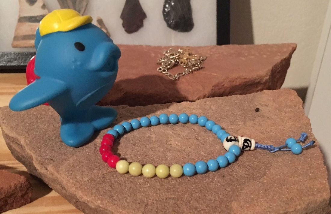 The Eternal Fishnu blessing the mala.